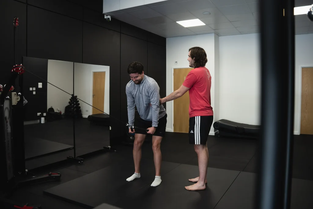 Bristol Biomechanics specialist leading a Functional Patterns movement assessment and pain management session