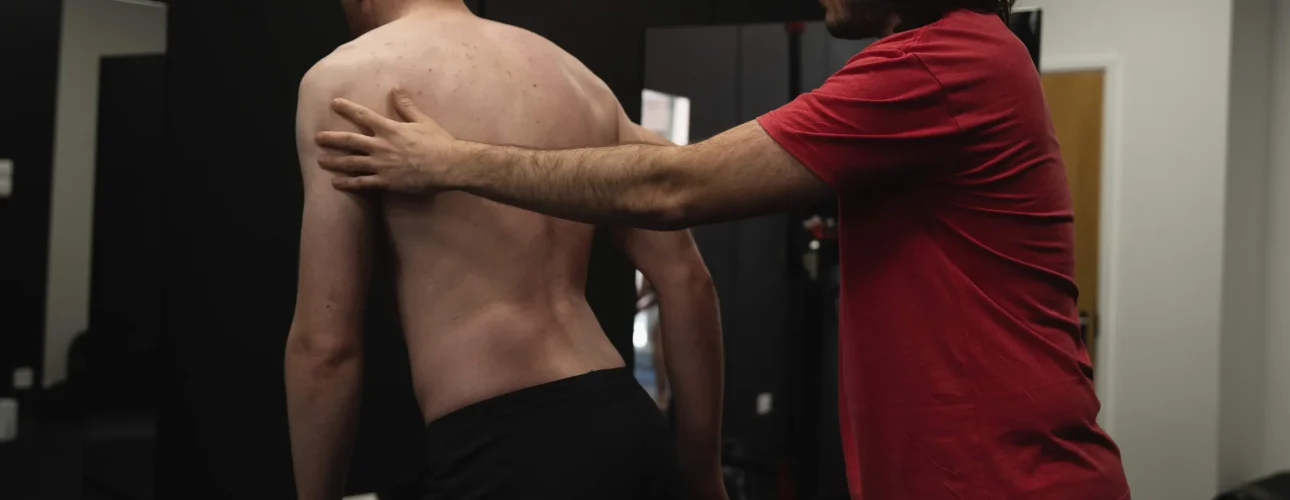 A client performing a Functional Patterns cable resistance exercise at Bristol Biomechanics